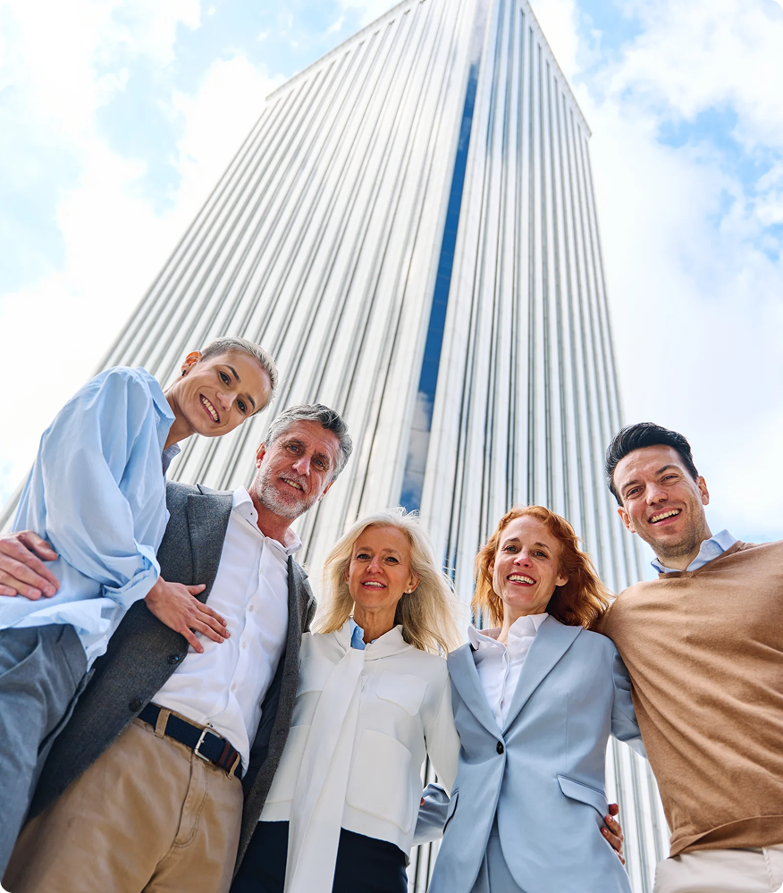 Huntington team standing outside a Dubai office building